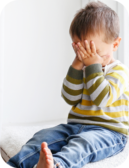 Mother trying to calm a crying baby.